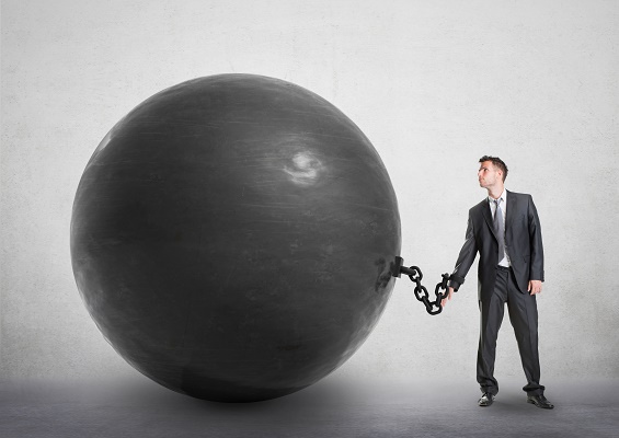 Salesman with ball and chain - Improve Sales Performance – What’s Holding You Back?