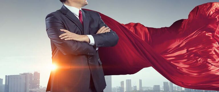 Buyer dressed as superhero against cityscape background