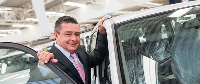 Man selling a new vehicle - What is Customer Success?