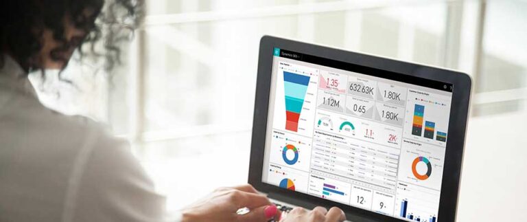 Woman on laptop - Five Ways CPQ Affects CX for Microsoft Dynamics CRM Users