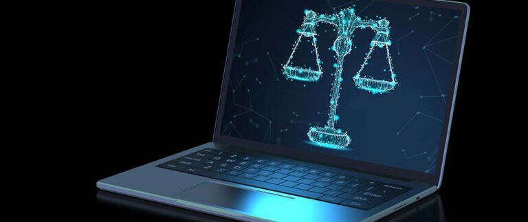 Computer and scales of justice