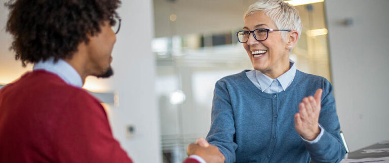 Man and woman shaking hands - Capitalizing on the Customer Experience