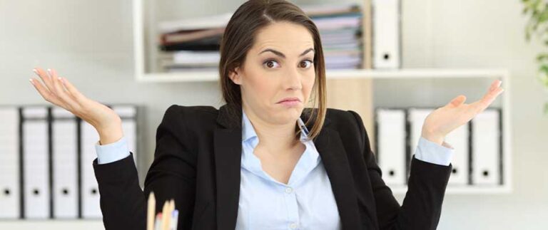 Woman shrugging - Best-in-Breed or All-in-One: Which Technology-Solution Approach Is Right for Your Business’s Customer-Communications Processes?