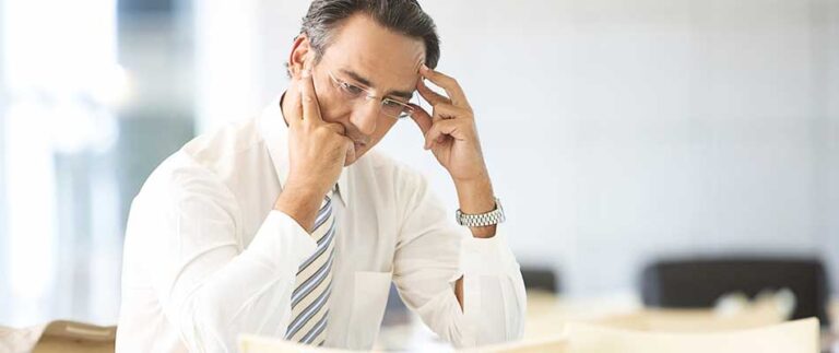 Man on the phone - Why You Need a Customer Communications Solution for Correspondence and Documents