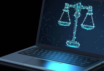 Computer and scales of justice